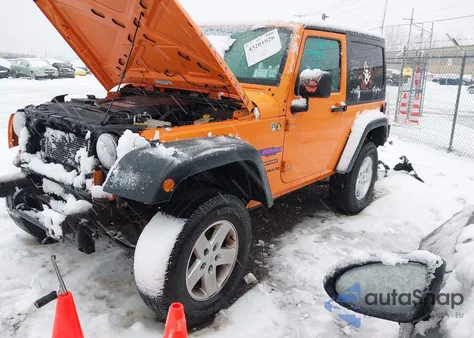 2012 Jeep Wrangler Sport z USA, uszkodzony, nr VIN 1C4AJWAG7CL186283